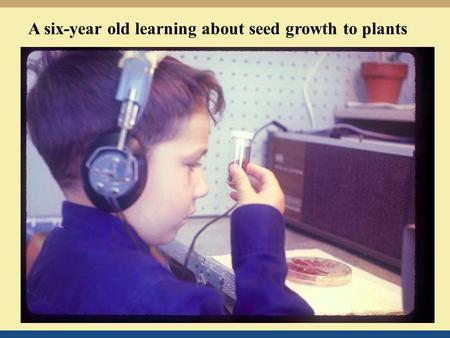 A six-year old learning about seed growth to plants.