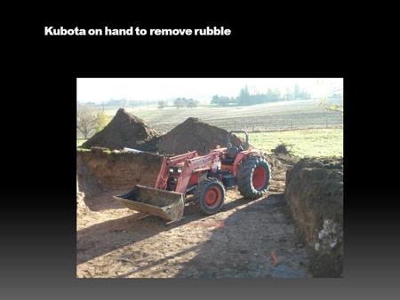 Kubota on hand to remove rubble. Farmall H with tilt trailer.