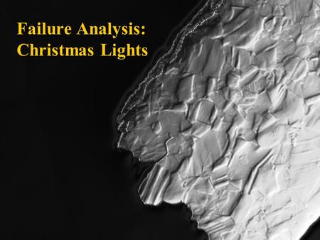 Failure Analysis: Christmas Lights. Case Description & Hypotheses Fracture of the bent brass contact piece in various light bulb sockets The unbent contact.