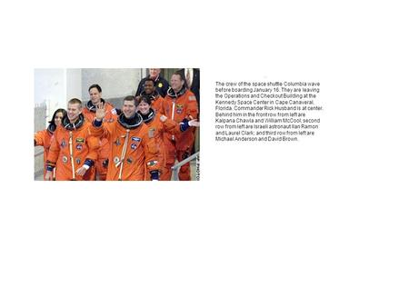 The crew of the space shuttle Columbia wave before boarding January 16. They are leaving the Operations and Checkout Building at the Kennedy Space Center.