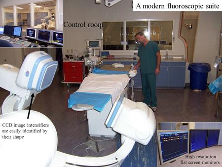 Control room High resolution flat screen monitors CCD image intensifiers are easily identified by their shape A modern fluoroscopic suite.