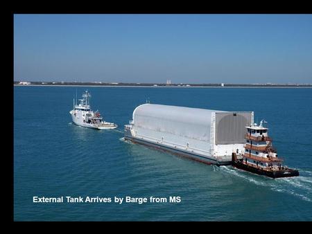 External Tank Arrives by Barge from MS. Vertical Assembly Building External Tank.