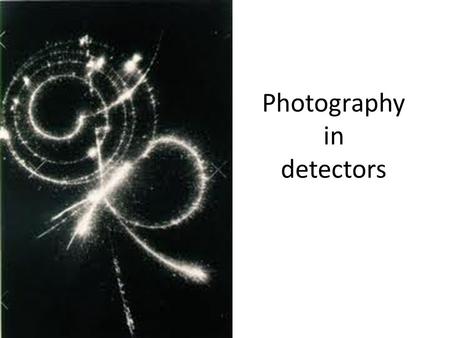 Photography in detectors. This cloud-chamber photograph, showing the track of a positively charged particle of electronic mass slowed down by passing.