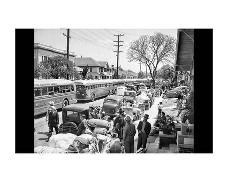 April 30, 1942: Buses line up at 23rd Street and Vermont Avenue to carry 600 Japanese to the temporary internment camp at Santa Anita racetrack. This.