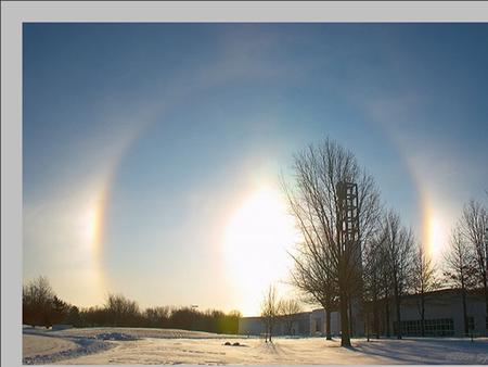 Sun dogs, or mock suns, are technically called solar parhelia (parhelia meaning with the sun) and appear as bright bursts of light formed when sunlight.