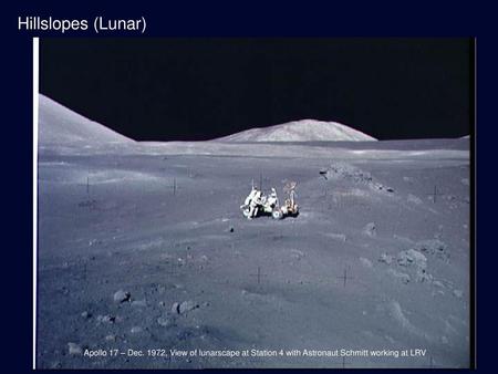 Hillslopes (Lunar) Apollo 17 – Dec. 1972, View of lunarscape at Station 4 with Astronaut Schmitt working at LRV.